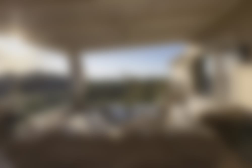 The well-shaded, panoramic terrace outside the communal space on the upper floor.